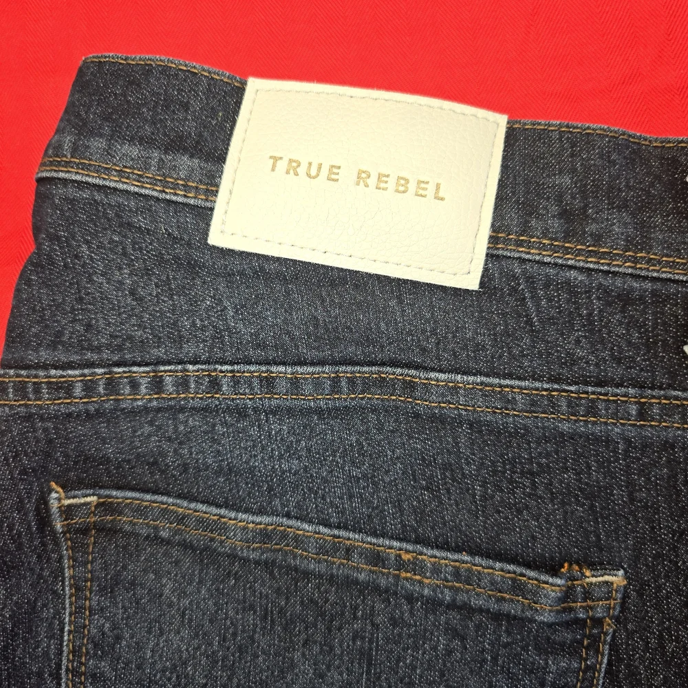 True Religion Black Jeans with Signature Pocket Stitching